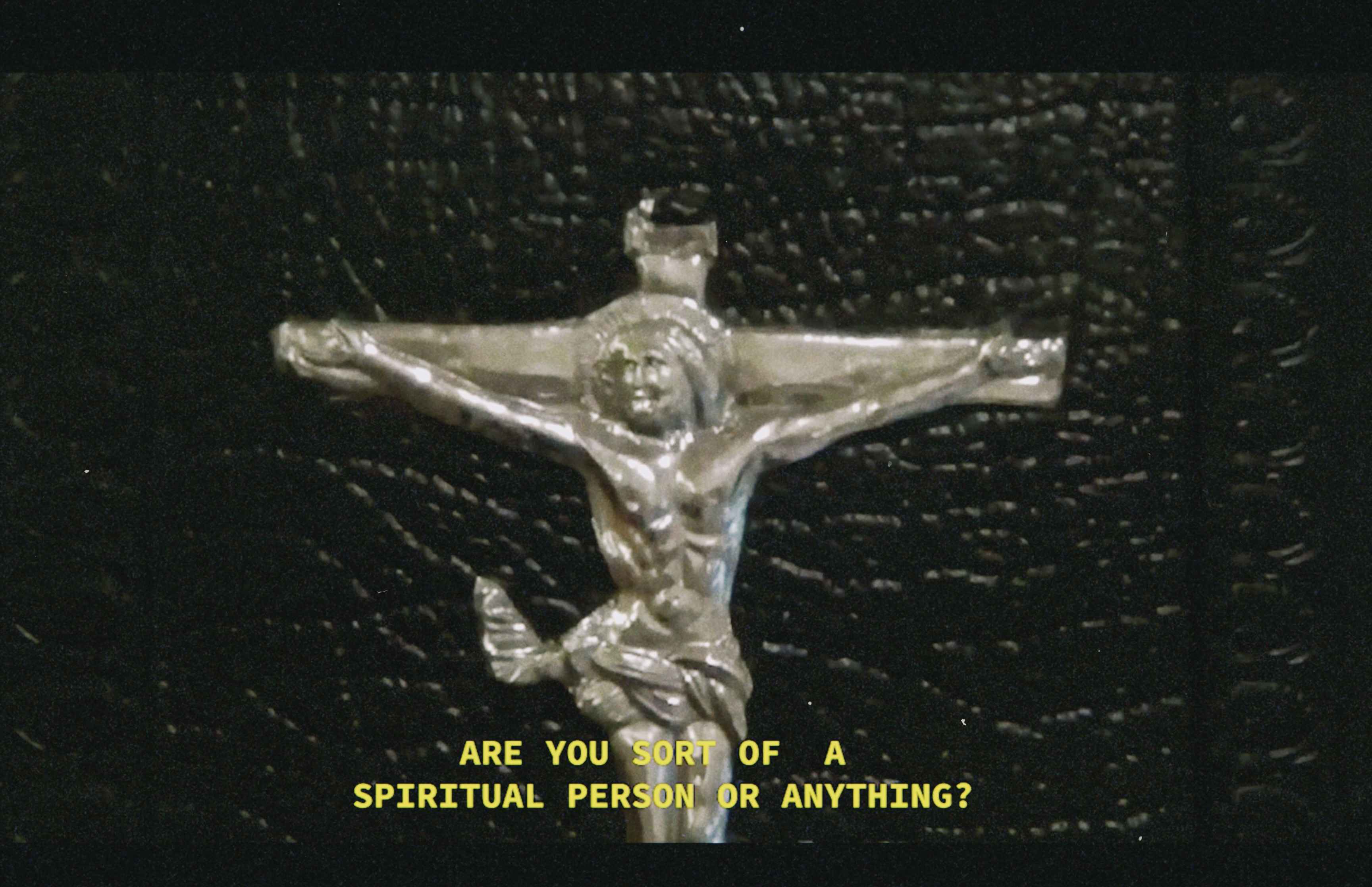 Still from Judgement Proof, Darya Diamond, 2020. SD video on CRTV, cast latex wash bucket.