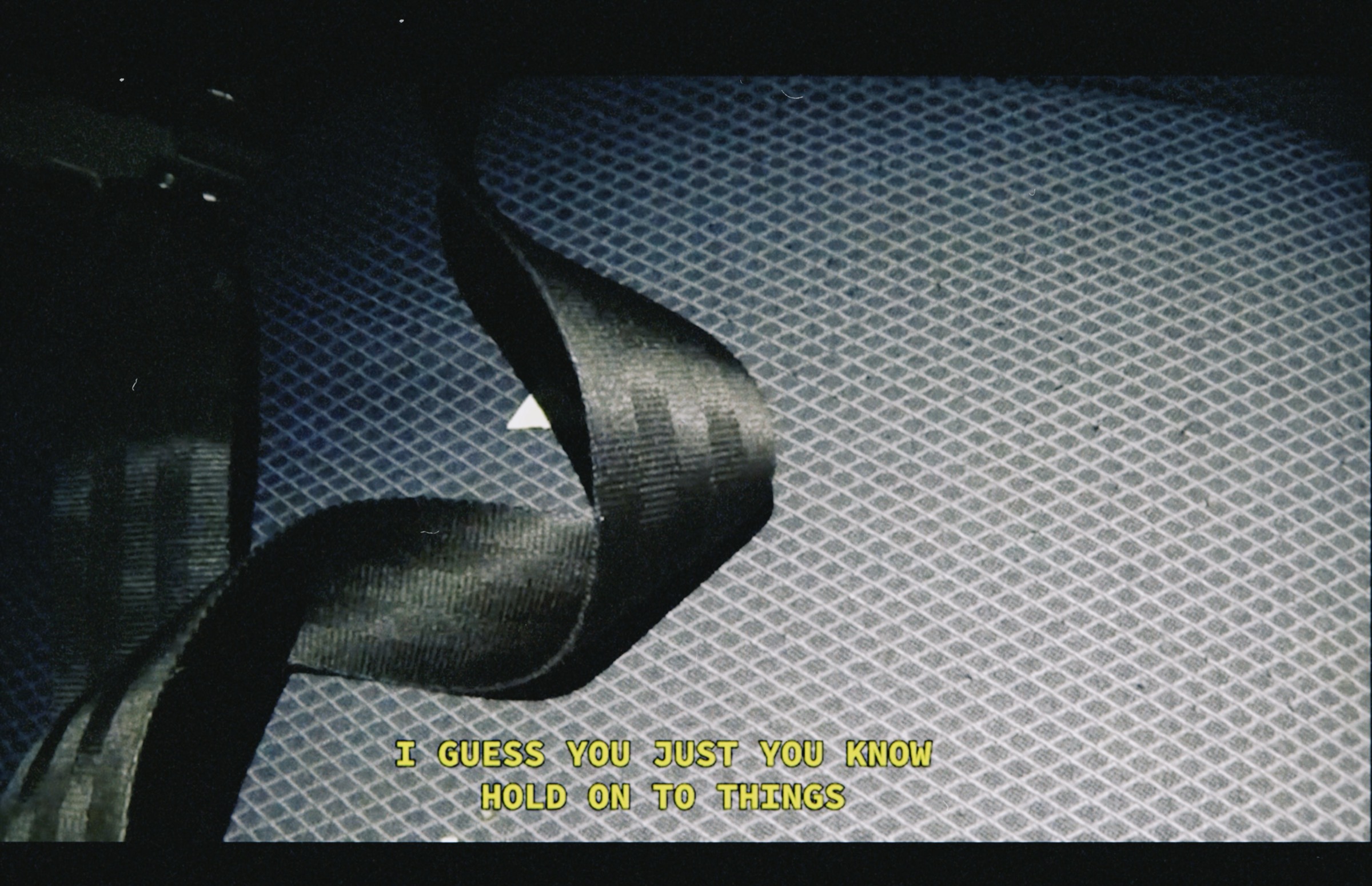 Still from Judgement Proof, Darya Diamond, 2020. SD video on CRTV, cast latex wash bucket.