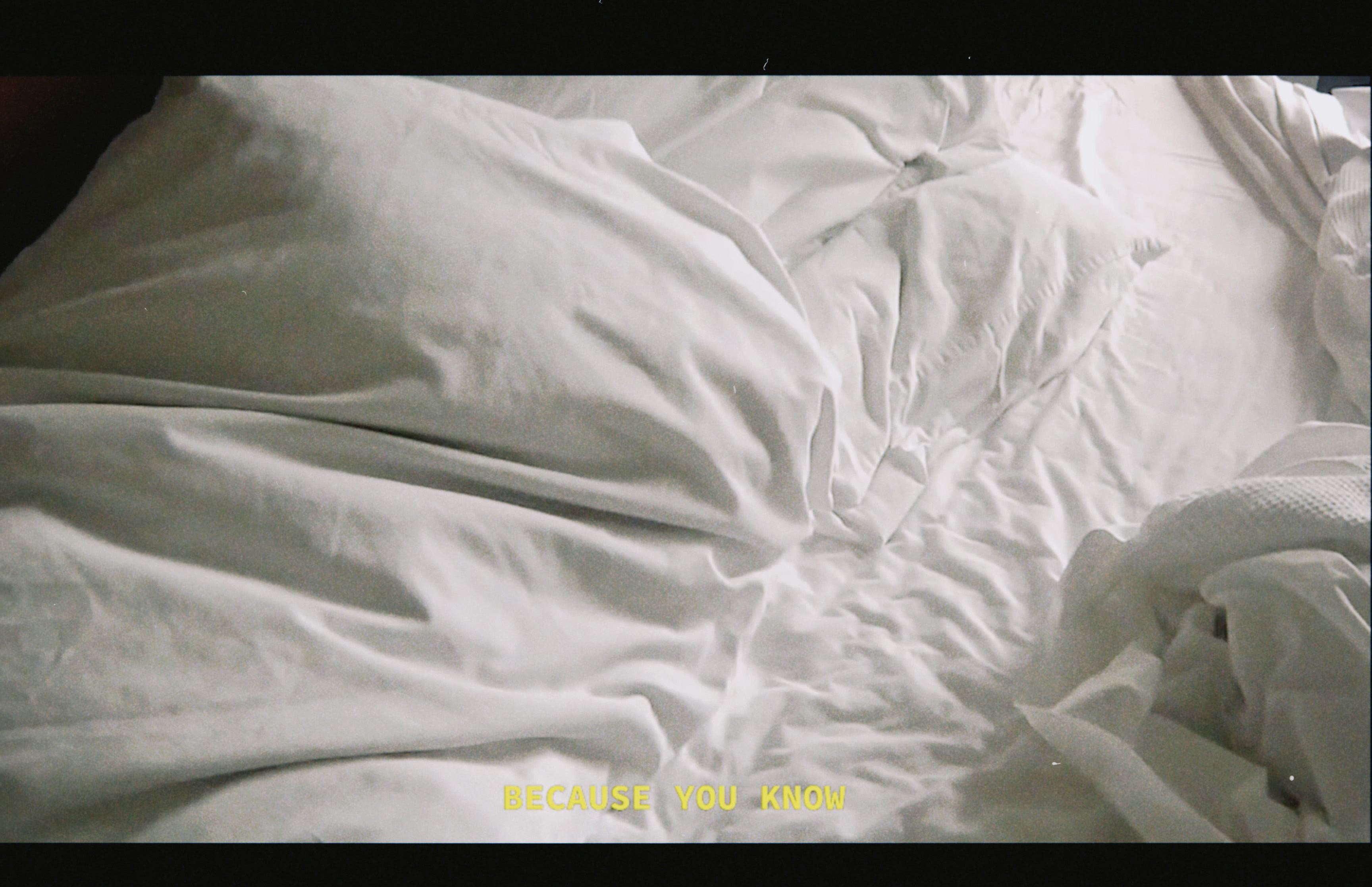 Still from Judgement Proof, Darya Diamond, 2020. SD video on CRTV, cast latex wash bucket.