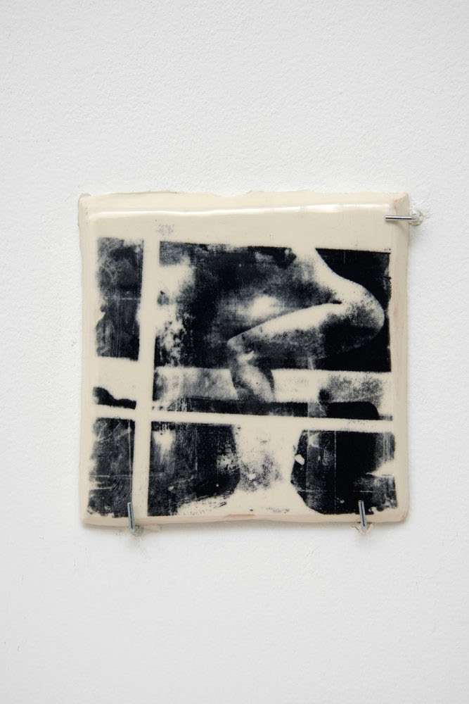 Untitled from Tile Series by Darya Diamond. Porcelain tile artwork featuring screen-printed imagery and exploring the body, repetition and domestic environments.